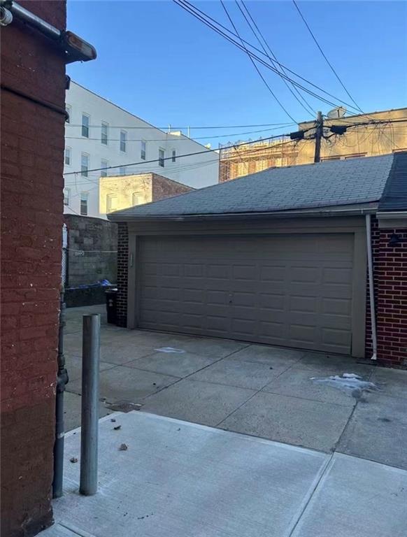 1253 70th Street Brooklyn, NY 11228 - Photo 5 of 13 a view of a garage
