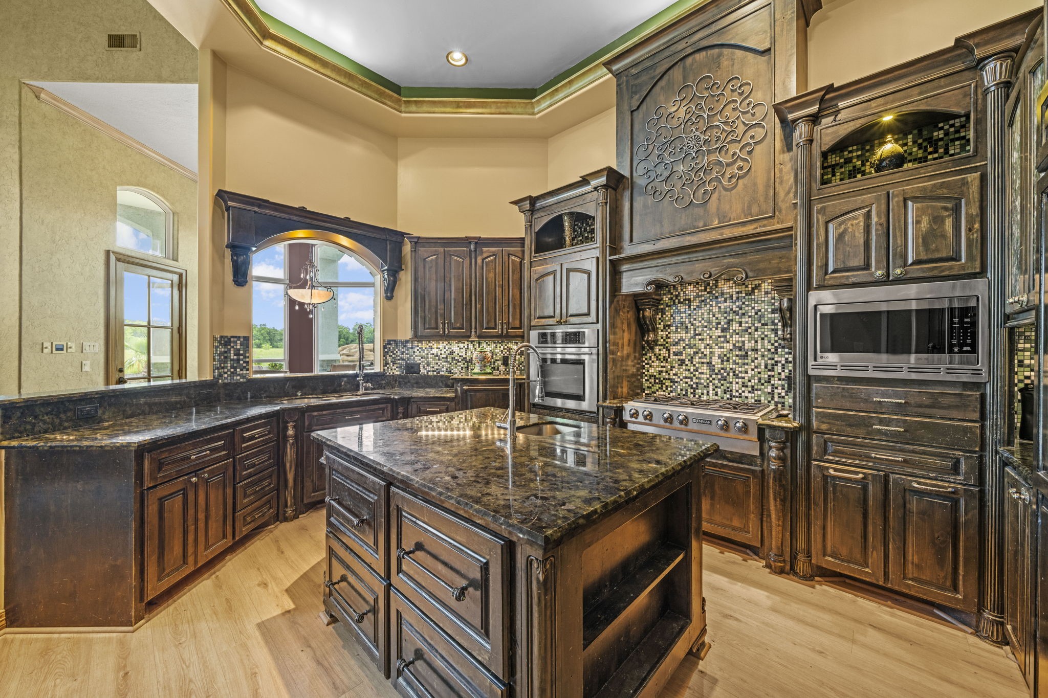 18732 Kz Road Cypress, TX 77433 - Photo 12 of 49 Beautiful design meets peak functionality in this dream kitchen, boasting soft-close cabinetry, a large walk-in pantry, premium 6-burner cooktop and additional deep sink built right into the center island.