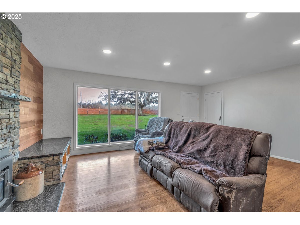 19448 Southwest Scholls Ferry Road Beaverton, OR 97007 - Photo 11 of 45 a living room with furniture and a large window