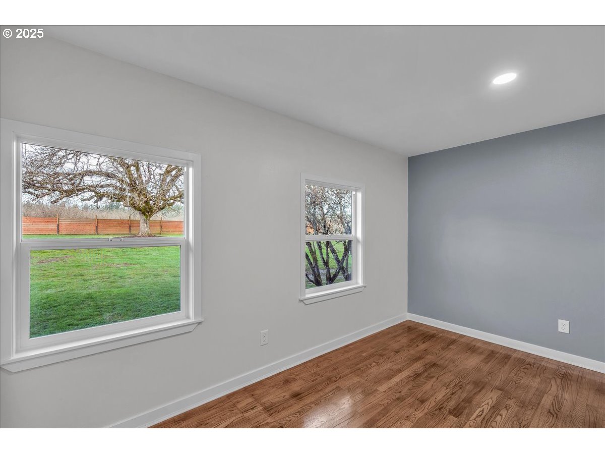 19448 Southwest Scholls Ferry Road Beaverton, OR 97007 - Photo 29 of 45 a view of an empty room with a window