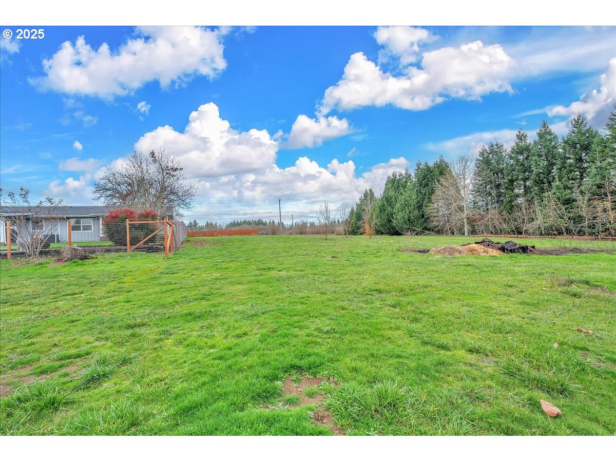 19448 Southwest Scholls Ferry Road Beaverton, OR 97007 - Photo 40 of 45 a view of a house with a yard