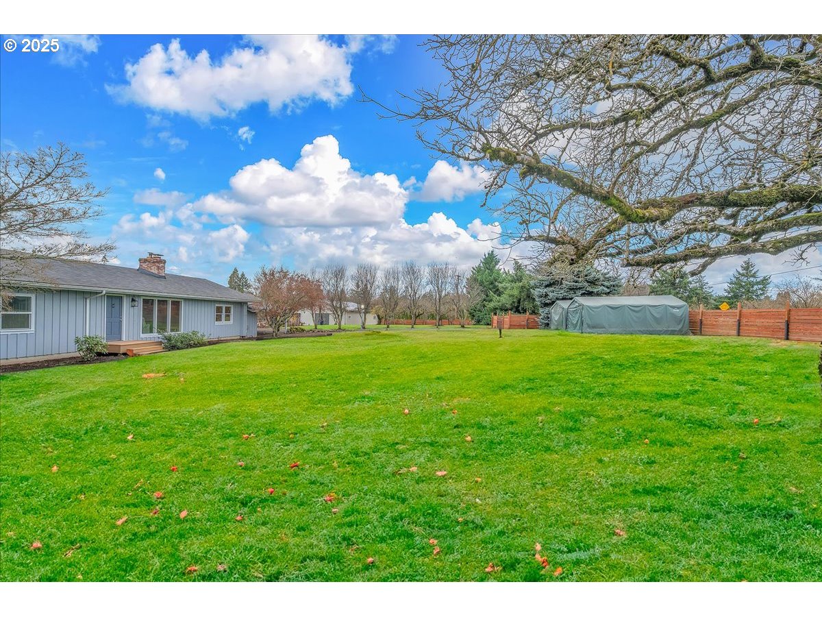 19448 Southwest Scholls Ferry Road Beaverton, OR 97007 - Photo 4 of 45 a view of a house with a big yard