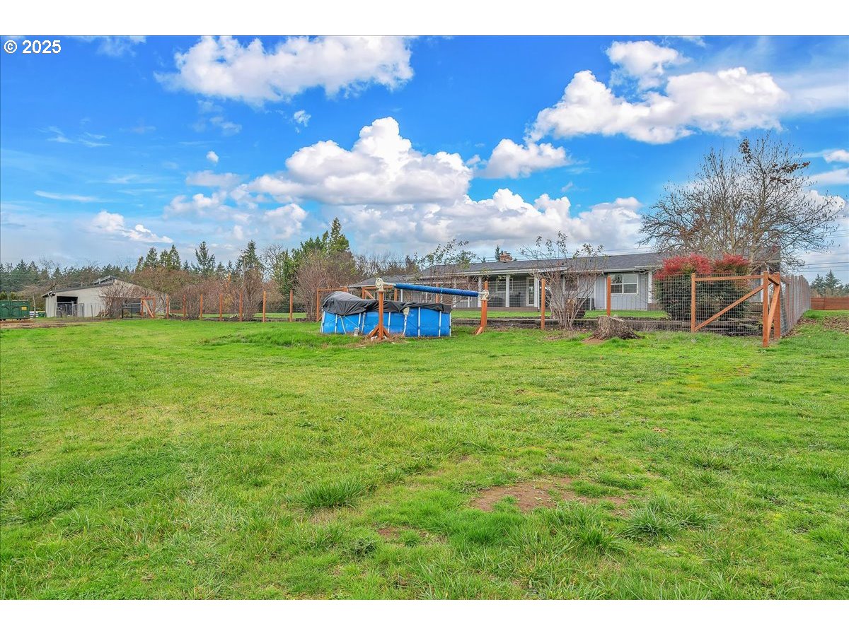 19448 Southwest Scholls Ferry Road Beaverton, OR 97007 - Photo 41 of 45 a view of a house with a big yard