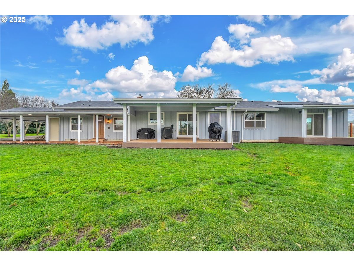 19448 Southwest Scholls Ferry Road Beaverton, OR 97007 - Photo 43 of 45 a view of a house with a backyard