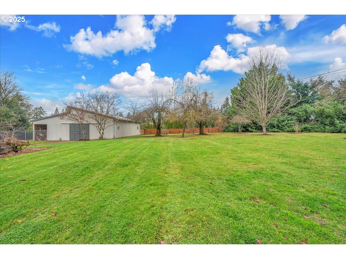 19448 Southwest Scholls Ferry Road Beaverton, OR 97007 - Photo 5 of 45 a view of a house with a big yard