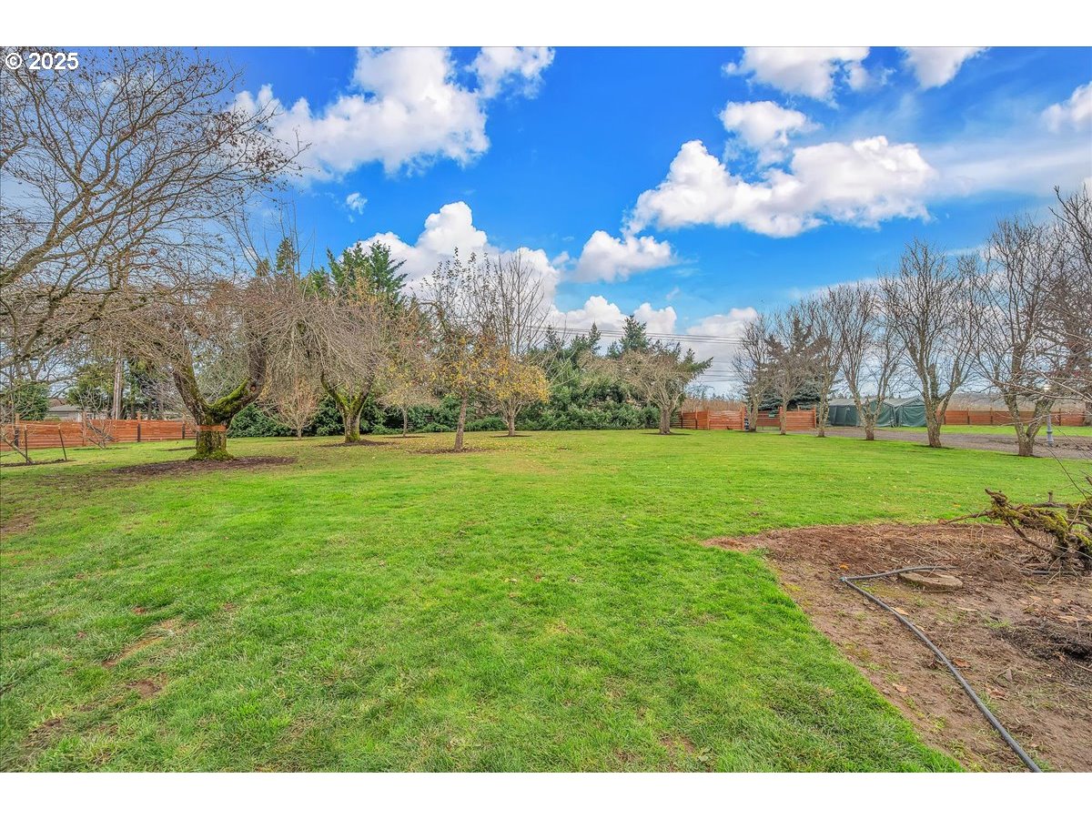 19448 Southwest Scholls Ferry Road Beaverton, OR 97007 - Photo 6 of 45 a view of a golf course with a lake