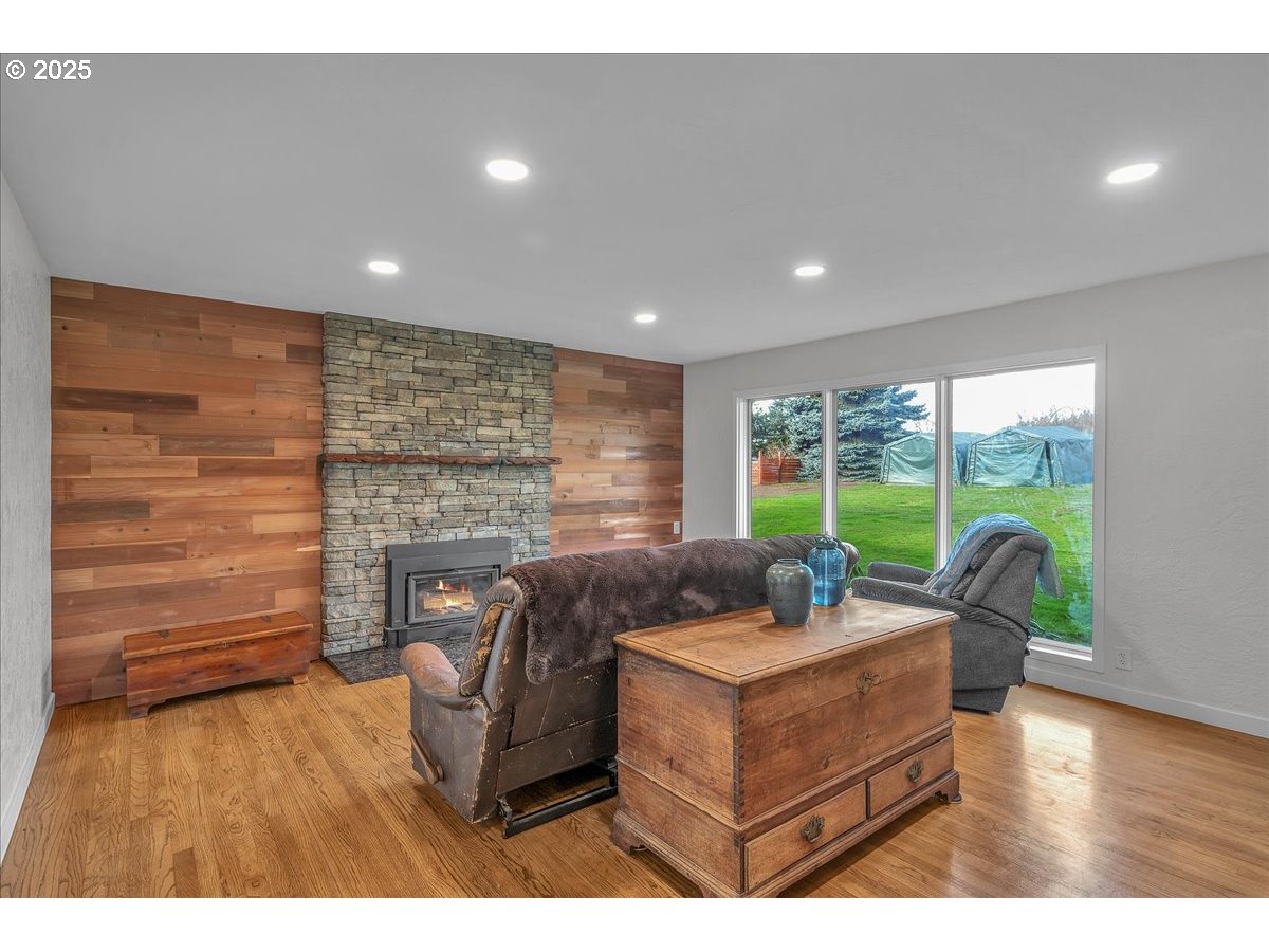 19448 Southwest Scholls Ferry Road Beaverton, OR 97007 - Photo 9 of 45 a living room with furniture and a fireplace