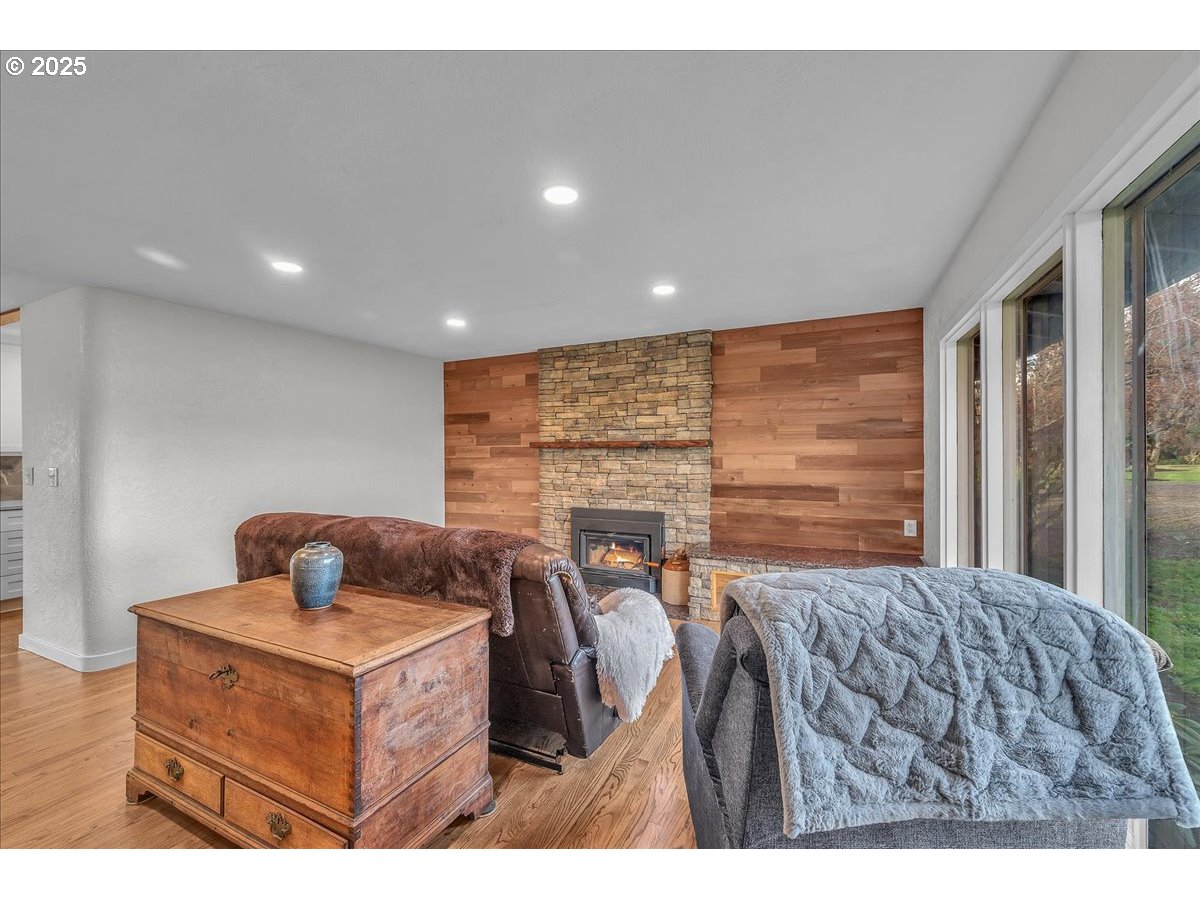 19448 Southwest Scholls Ferry Road Beaverton, OR 97007 - Photo 10 of 45 a bedroom with a bed and wooden floor