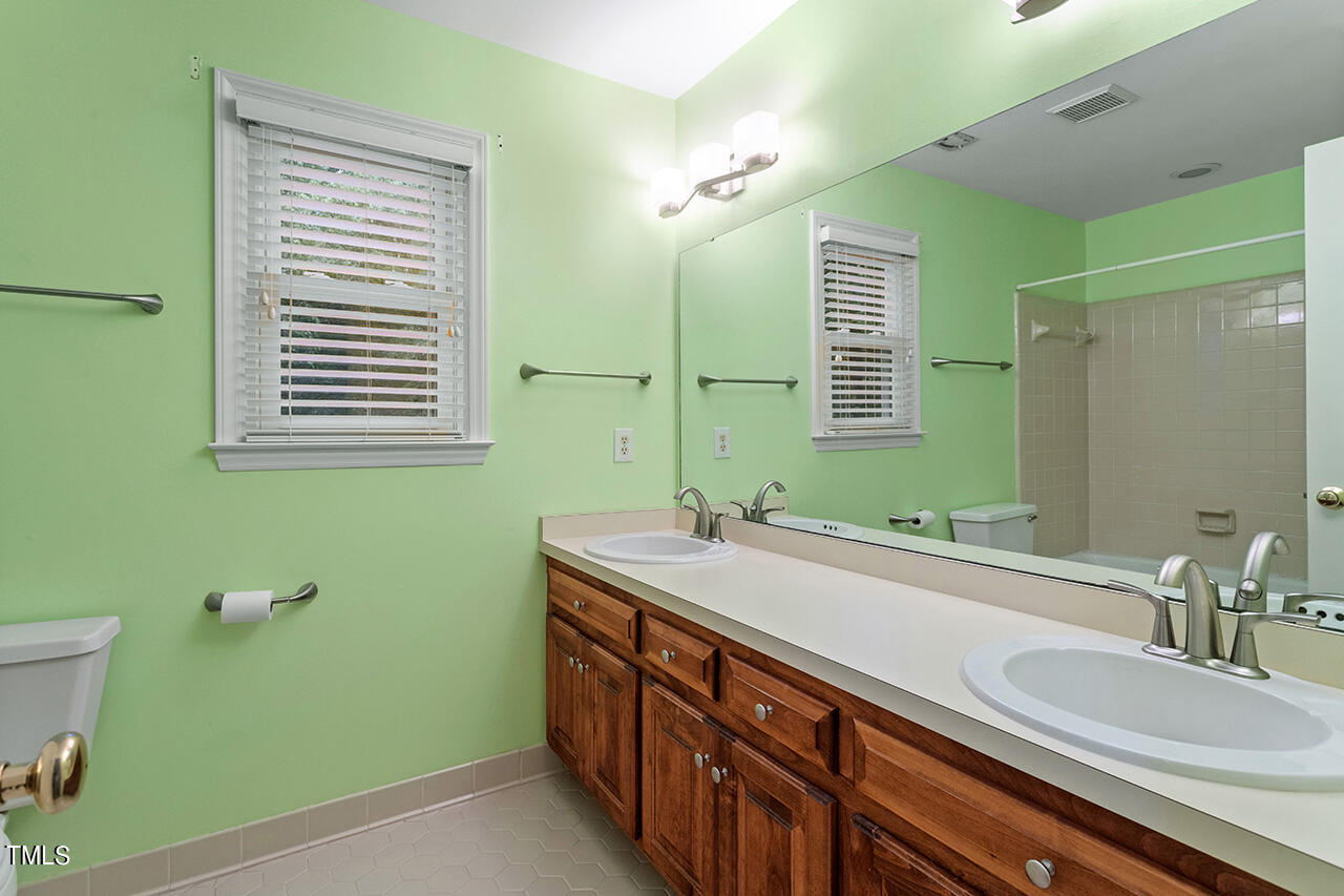 1925 Hamrick Drive Raleigh, NC 27615 - Photo 25 of 38 Hall Bath