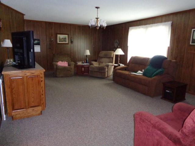 11 Bonnertown Road Five Points, TN 38457 - Photo 3 of 24 a living room with furniture a chandelier and a window