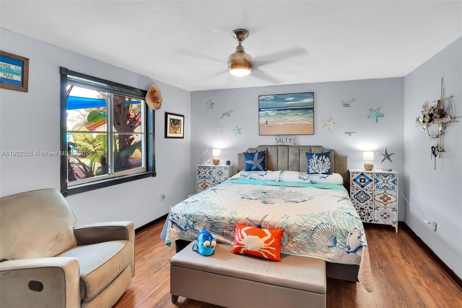 11035 Southwest 148th Place Miami, FL 33196 - Photo 17 of 48 a bedroom with furniture and a window