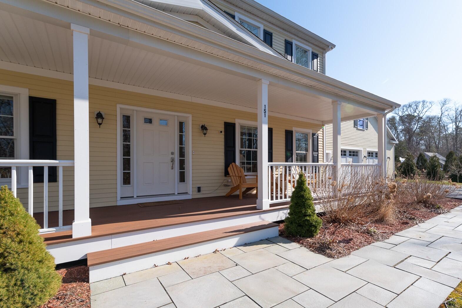 151 Tonset Road Orleans, MA 02653 - Photo 2 of 44 a front view of a house with entryway