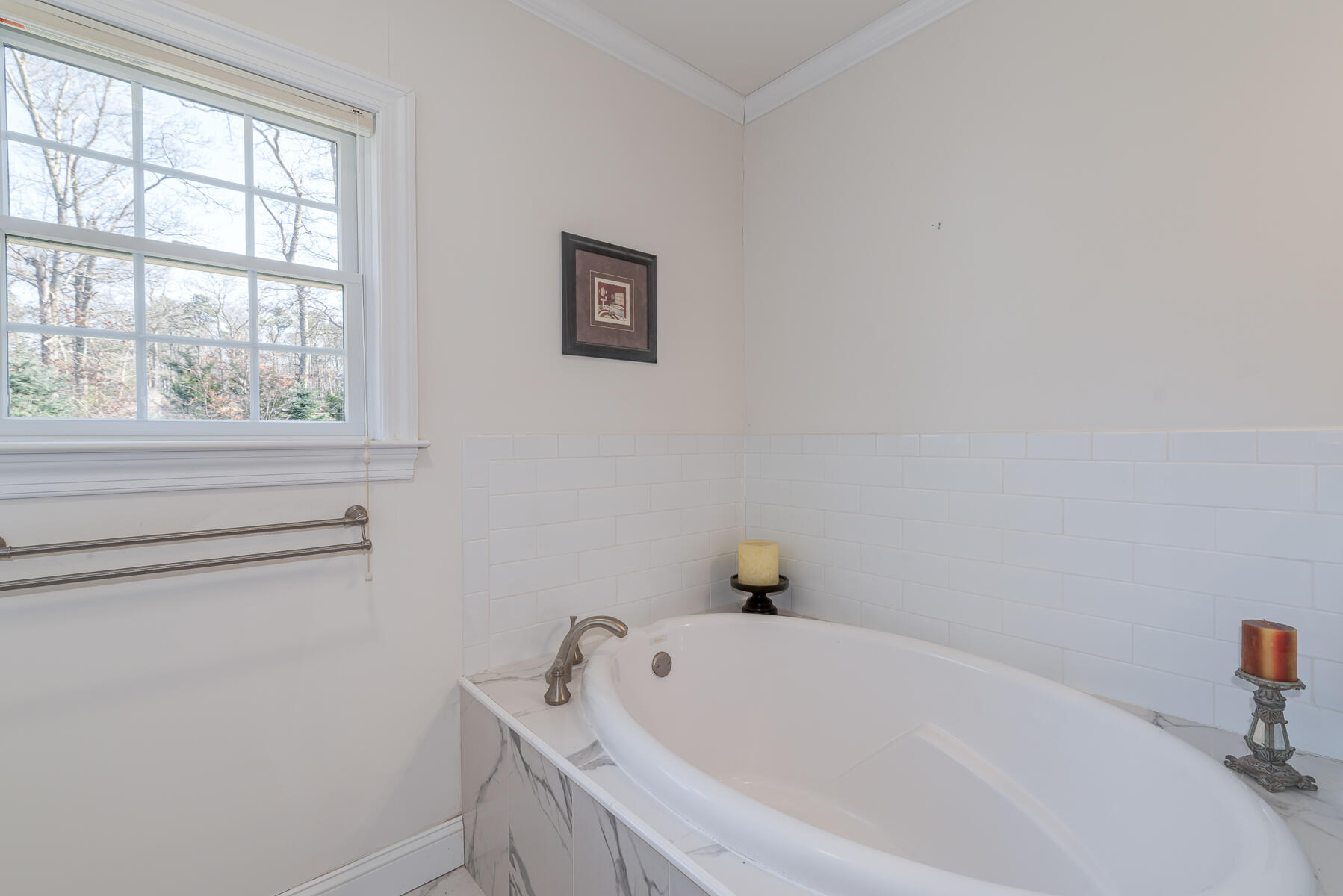 151 Tonset Road Orleans, MA 02653 - Photo 24 of 44 a white bath tub sitting next to a white sink