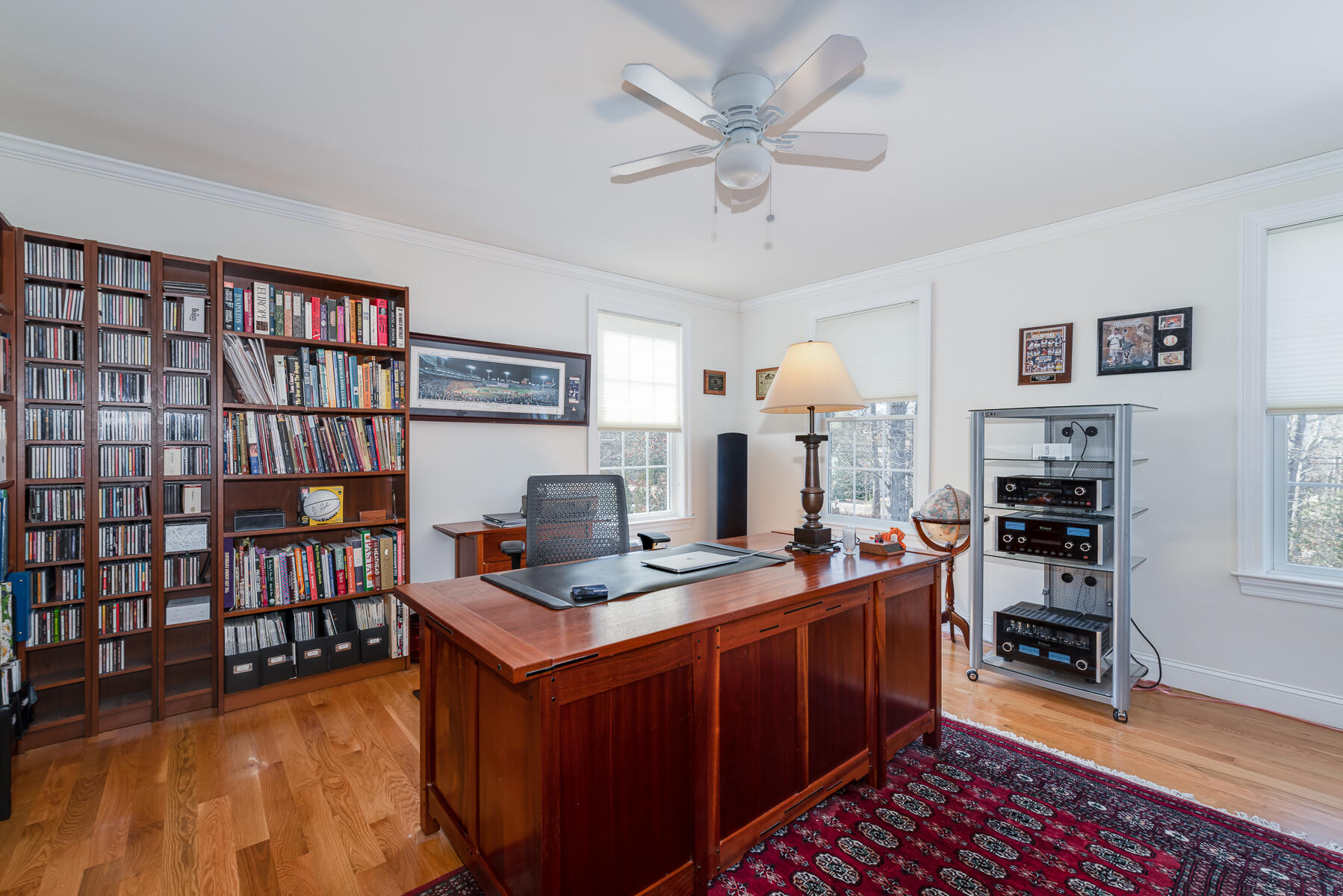 151 Tonset Road Orleans, MA 02653 - Photo 29 of 44 a room with furniture a bookshelf and a window