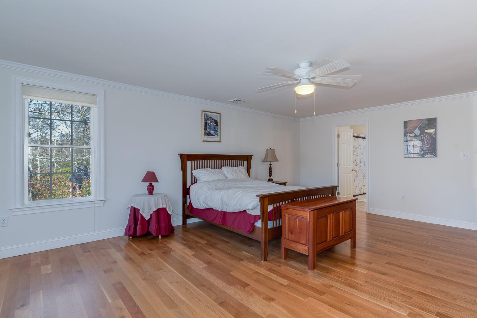 151 Tonset Road Orleans, MA 02653 - Photo 35 of 44 a bedroom with furniture and a window