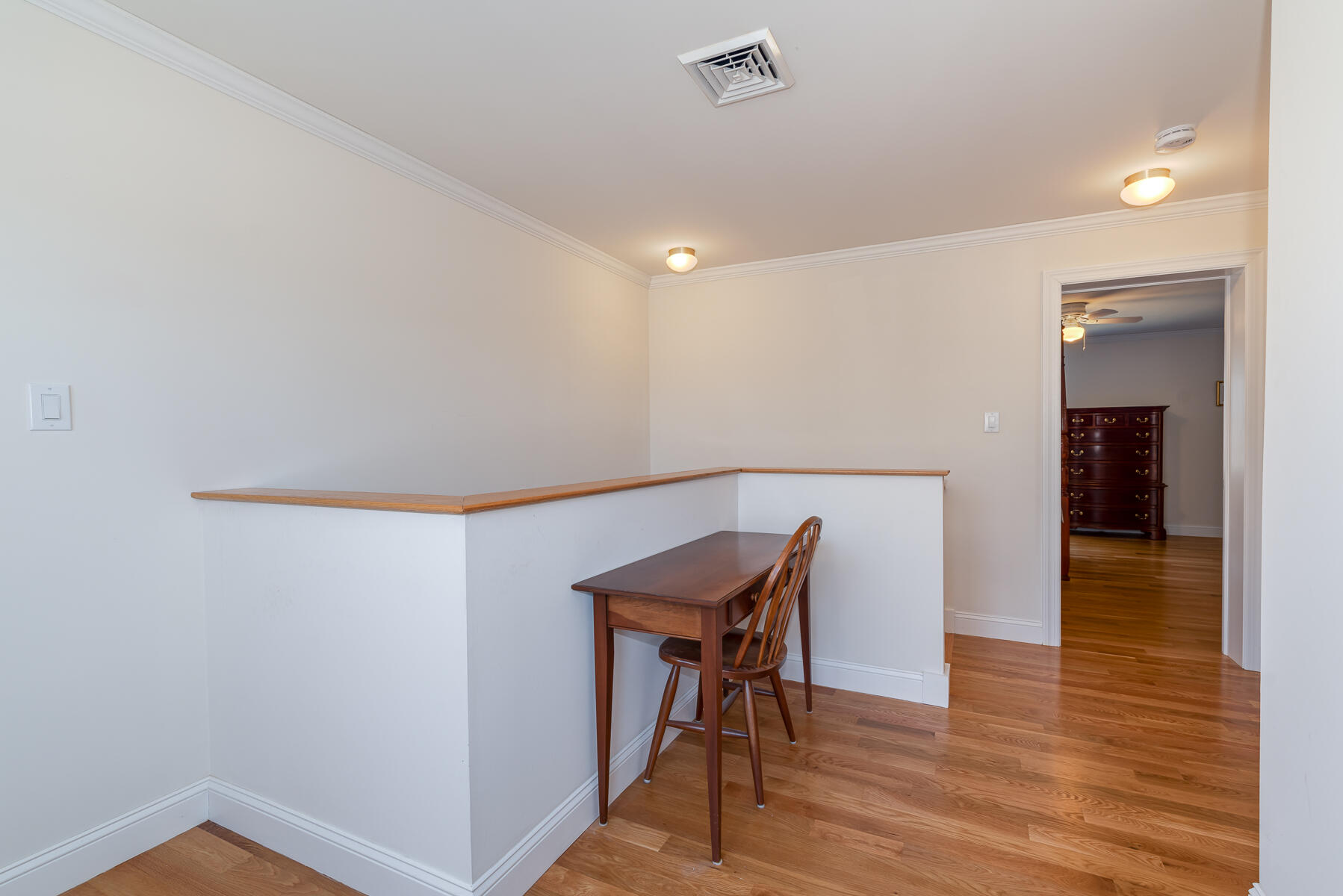 151 Tonset Road Orleans, MA 02653 - Photo 38 of 44 a workspace with furniture and wooden floor