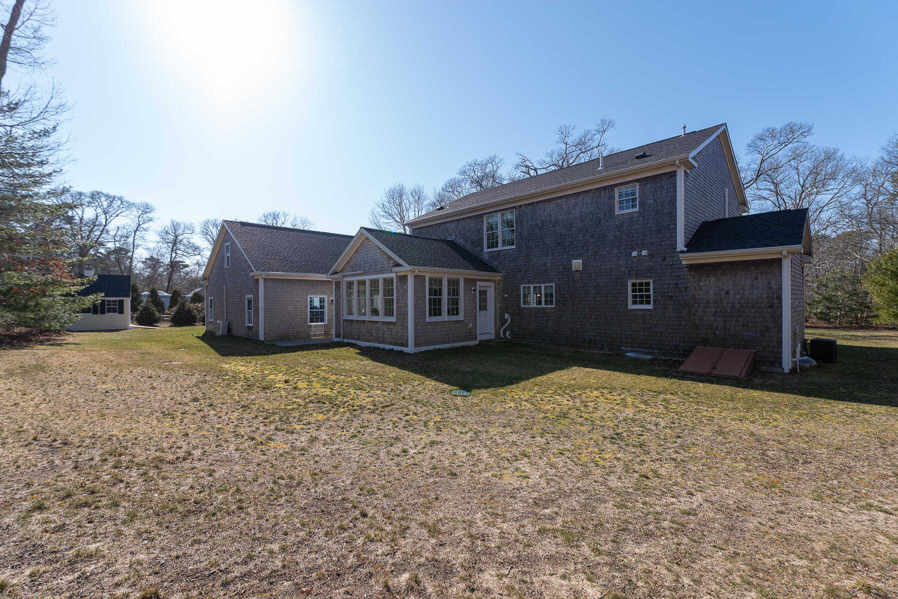 151 Tonset Road Orleans, MA 02653 - Photo 4 of 44 a house with a yard