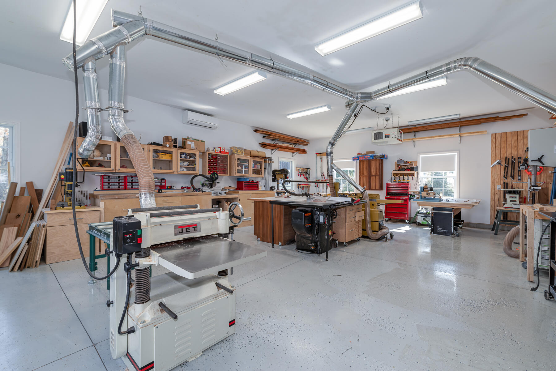 151 Tonset Road Orleans, MA 02653 - Photo 41 of 44 a room with lots of furniture and white walls