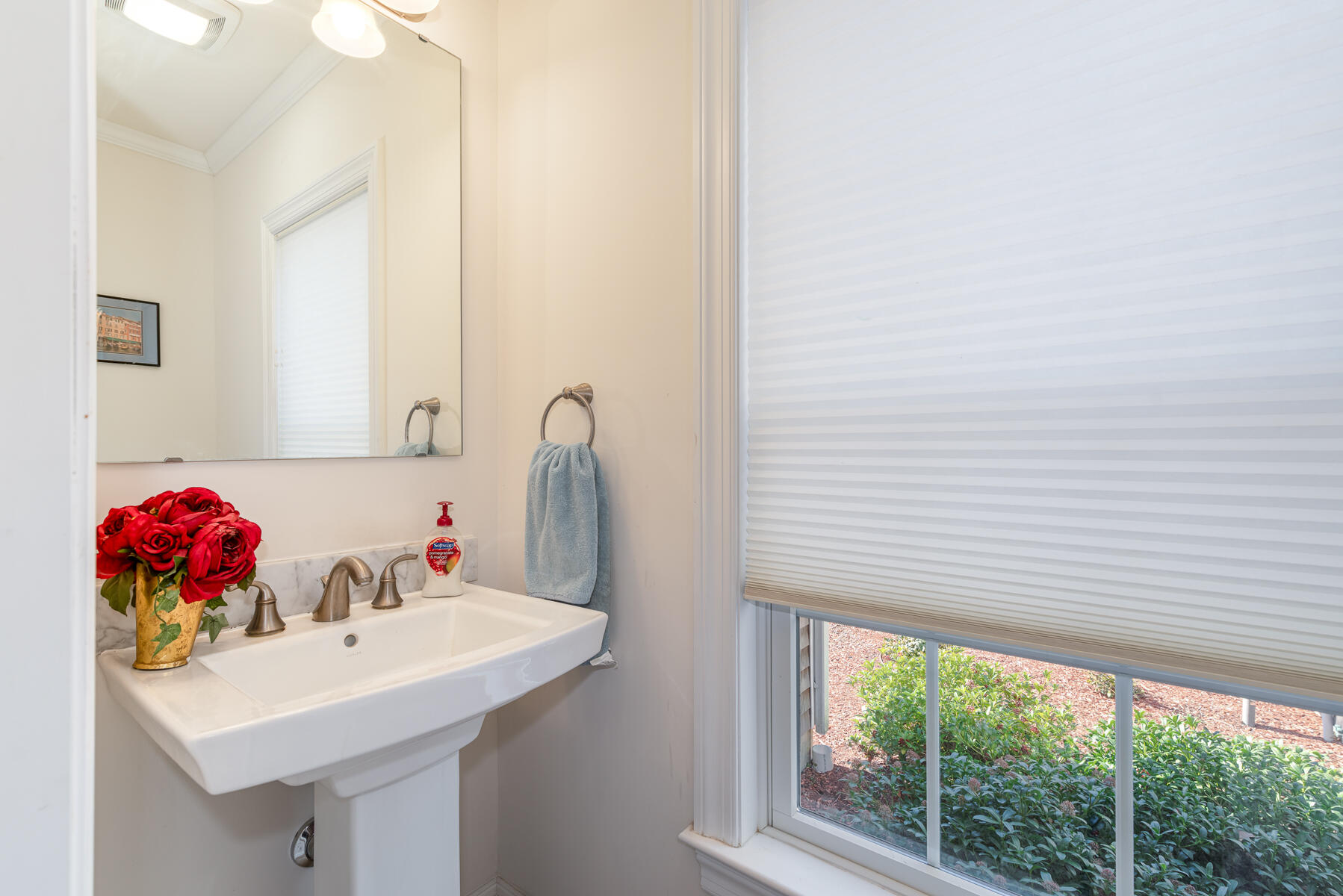 151 Tonset Road Orleans, MA 02653 - Photo 43 of 44 a bathroom with a sink and a mirror