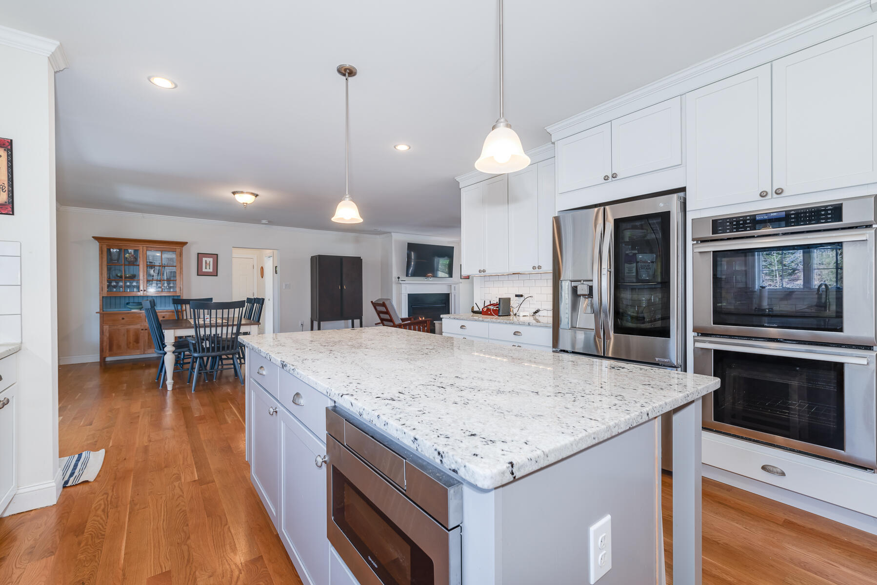 151 Tonset Road Orleans, MA 02653 - Photo 9 of 44 a kitchen with stainless steel appliances granite countertop a stove and a refrigerator