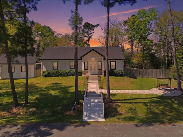 a view of a house with swimming pool