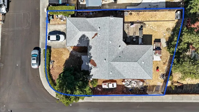 an aerial view of a house with garden