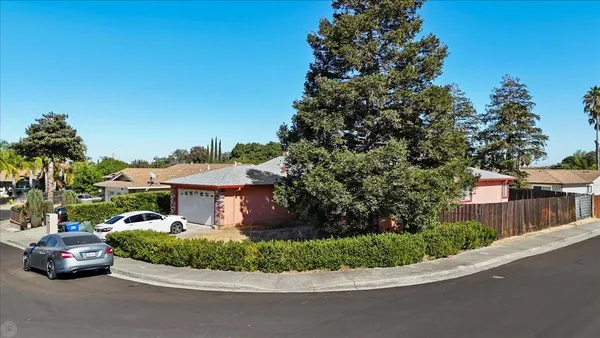 a view of front of house with a yard