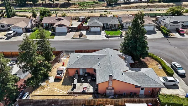 an aerial view of a house with a garden