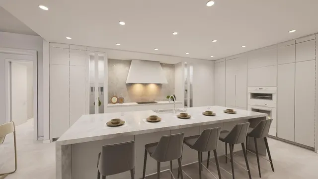 a kitchen that has a table and chairs in it