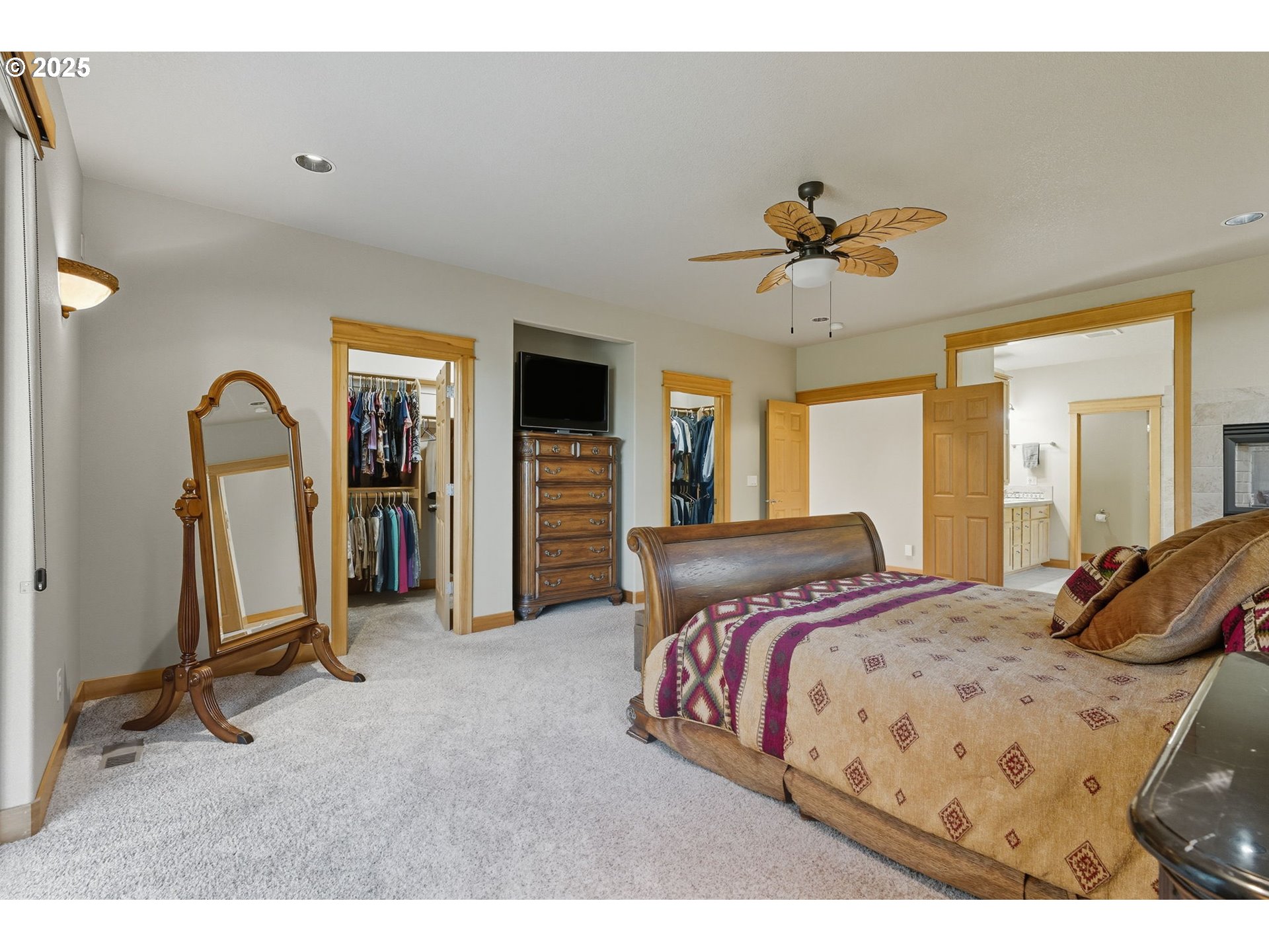 9573 South Gribble Road Canby, OR 97013 - Photo 25 of 48 a bedroom with a bed and a chandelier