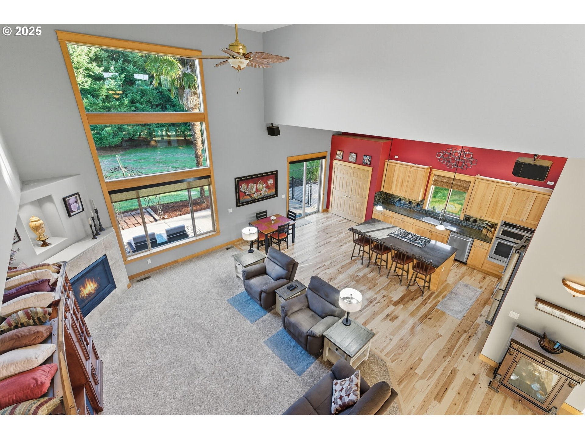 9573 South Gribble Road Canby, OR 97013 - Photo 29 of 48 a living room with furniture and a floor to ceiling window