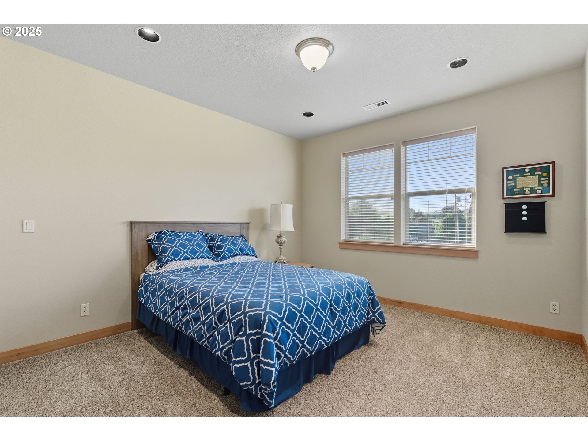 9573 South Gribble Road Canby, OR 97013 - Photo 33 of 48 a bedroom with a bed and a window