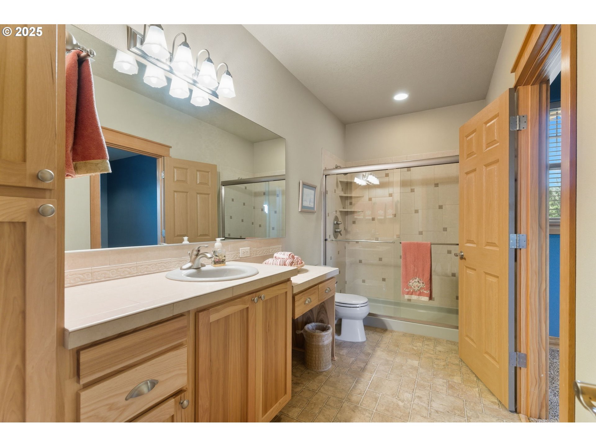 9573 South Gribble Road Canby, OR 97013 - Photo 34 of 48 a bathroom with a sink a toilet and shower