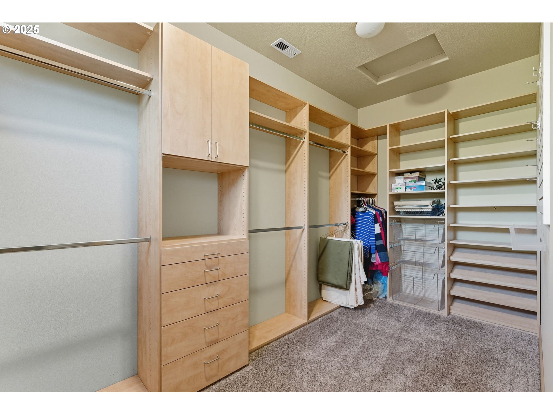 9573 South Gribble Road Canby, OR 97013 - Photo 36 of 48 a view of walk in closet with storage