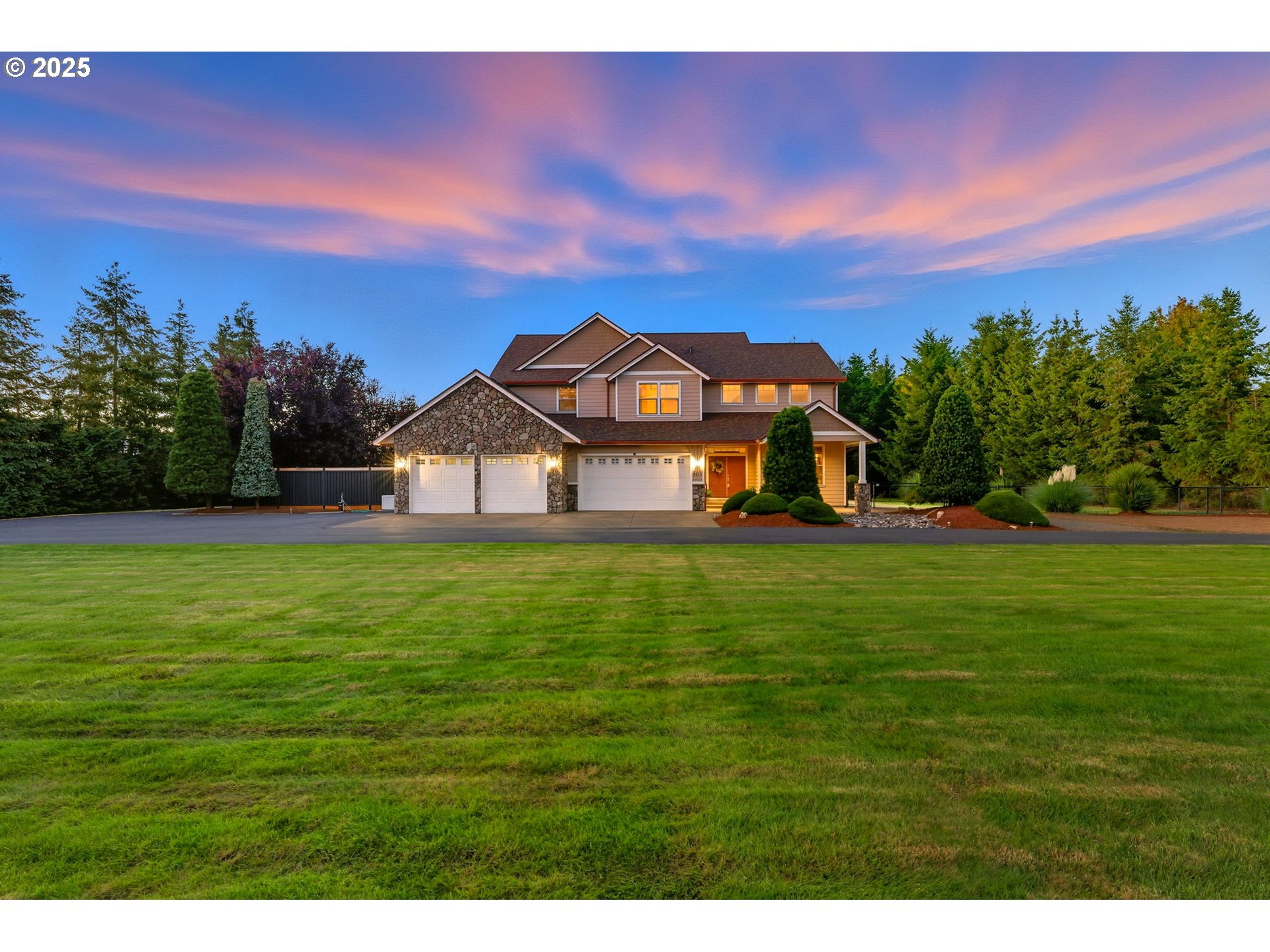 9573 South Gribble Road Canby, OR 97013 - Photo 4 of 48 a view of a big house with a big yard and large trees
