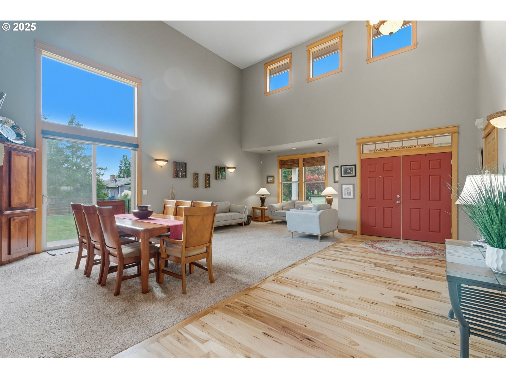 9573 South Gribble Road Canby, OR 97013 - Photo 8 of 48 a living room with furniture a dining table and a potted plant