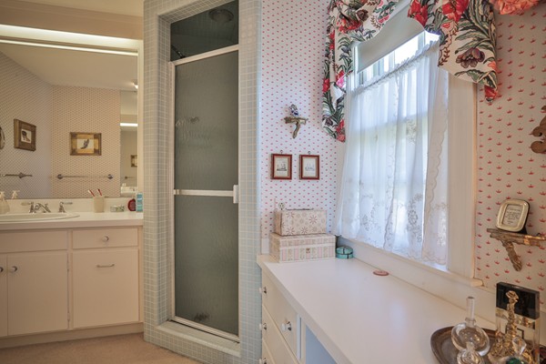 401 Jerusalem Road Cohasset, MA 02025 - Photo 19 of 29 a bathroom with a sink a toilet and shower
