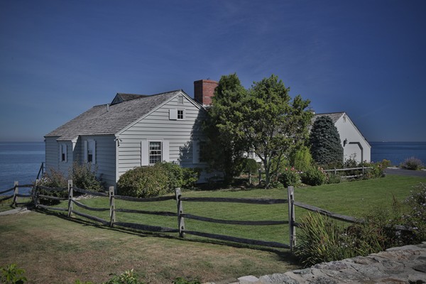 401 Jerusalem Road Cohasset, MA 02025 - Photo 28 of 29 a front view of a house with a garden