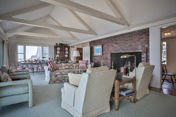 401 Jerusalem Road Cohasset, MA 02025 - Photo 5 of 29 a living room with furniture and a fireplace