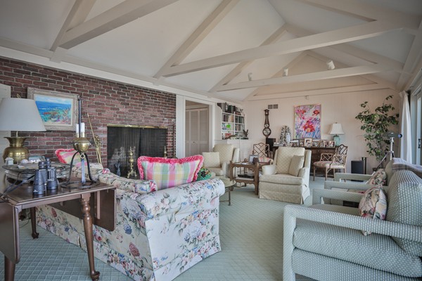401 Jerusalem Road Cohasset, MA 02025 - Photo 7 of 29 a living room with furniture and a fireplace