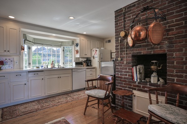 401 Jerusalem Road Cohasset, MA 02025 - Photo 8 of 29 a room with cabinets and wooden floor