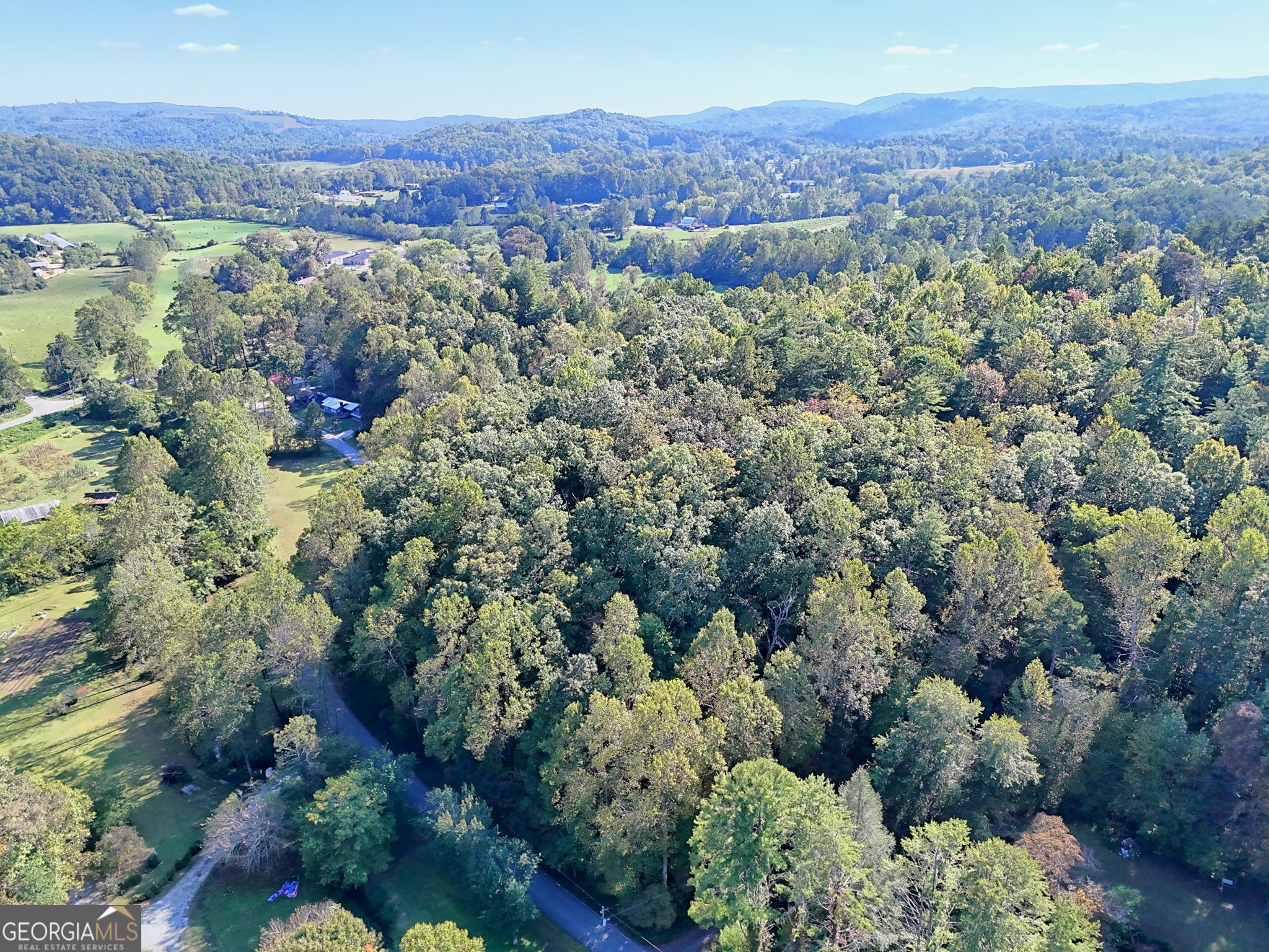 0 Woodall Road Tiger, GA 30576 - Photo 11 of 14 an aerial view of a town with trees