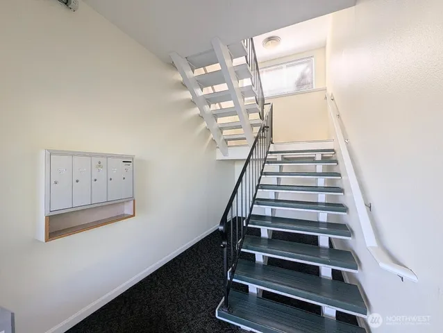 a view of entryway with stairs