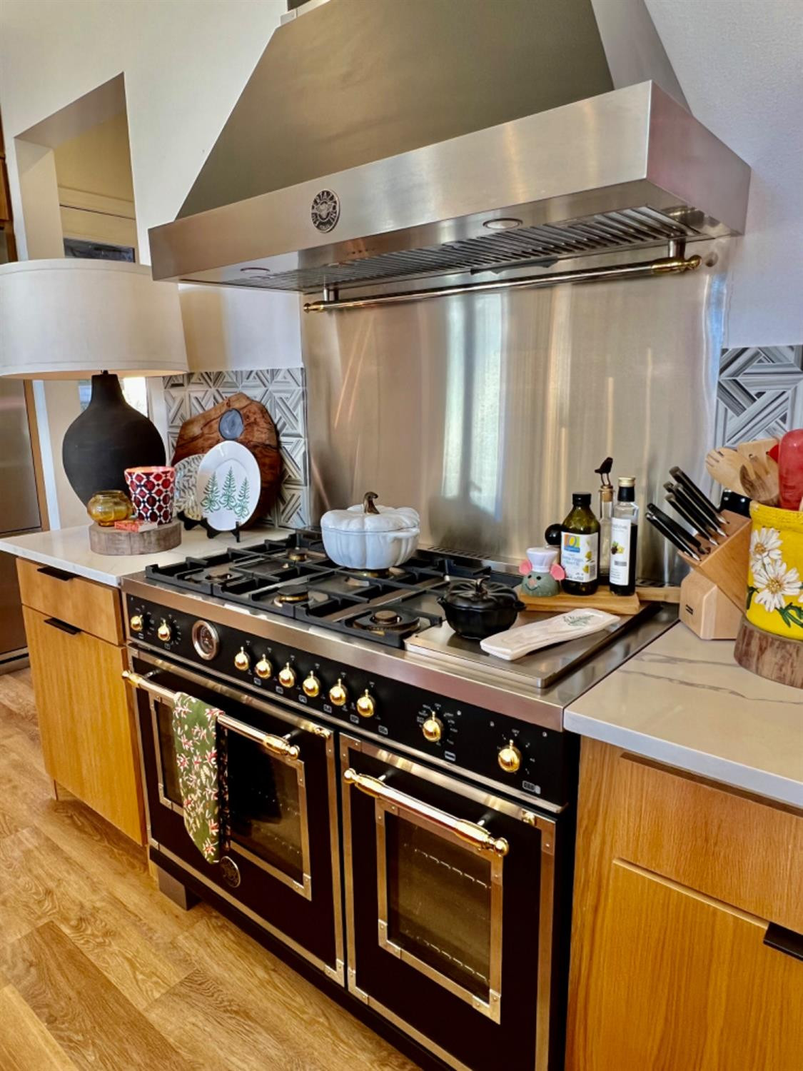 5902 112th Street Lubbock, TX 79424 - Photo 13 of 47 a stove top oven sitting inside of a kitchen