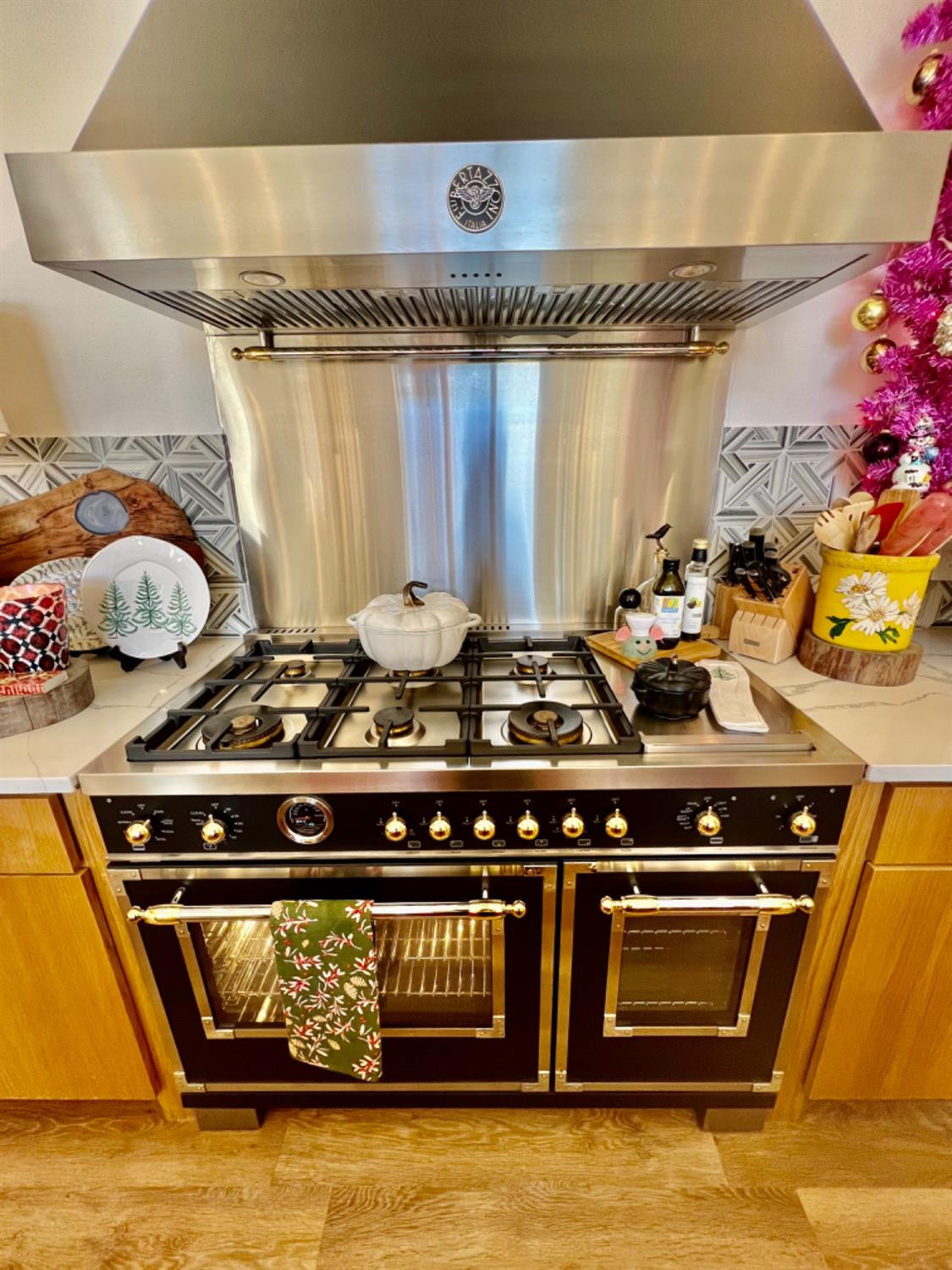 5902 112th Street Lubbock, TX 79424 - Photo 14 of 47 a stove top oven sitting inside of a kitchen
