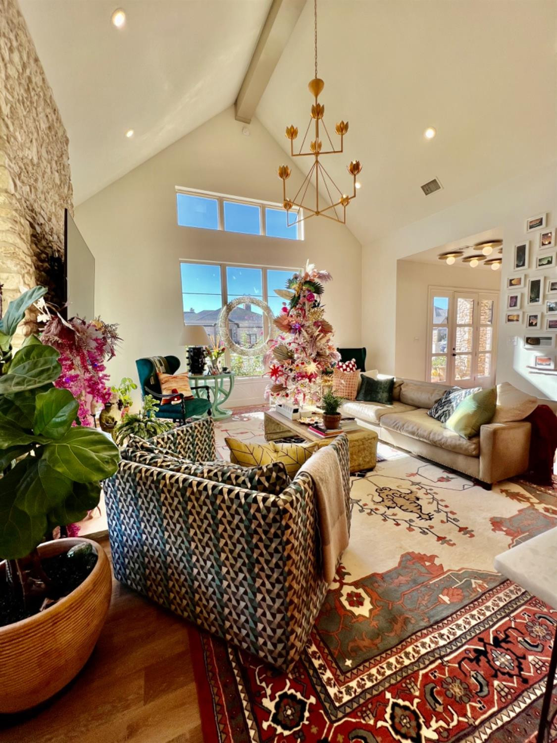 5902 112th Street Lubbock, TX 79424 - Photo 23 of 47 a living room with furniture and a chandelier