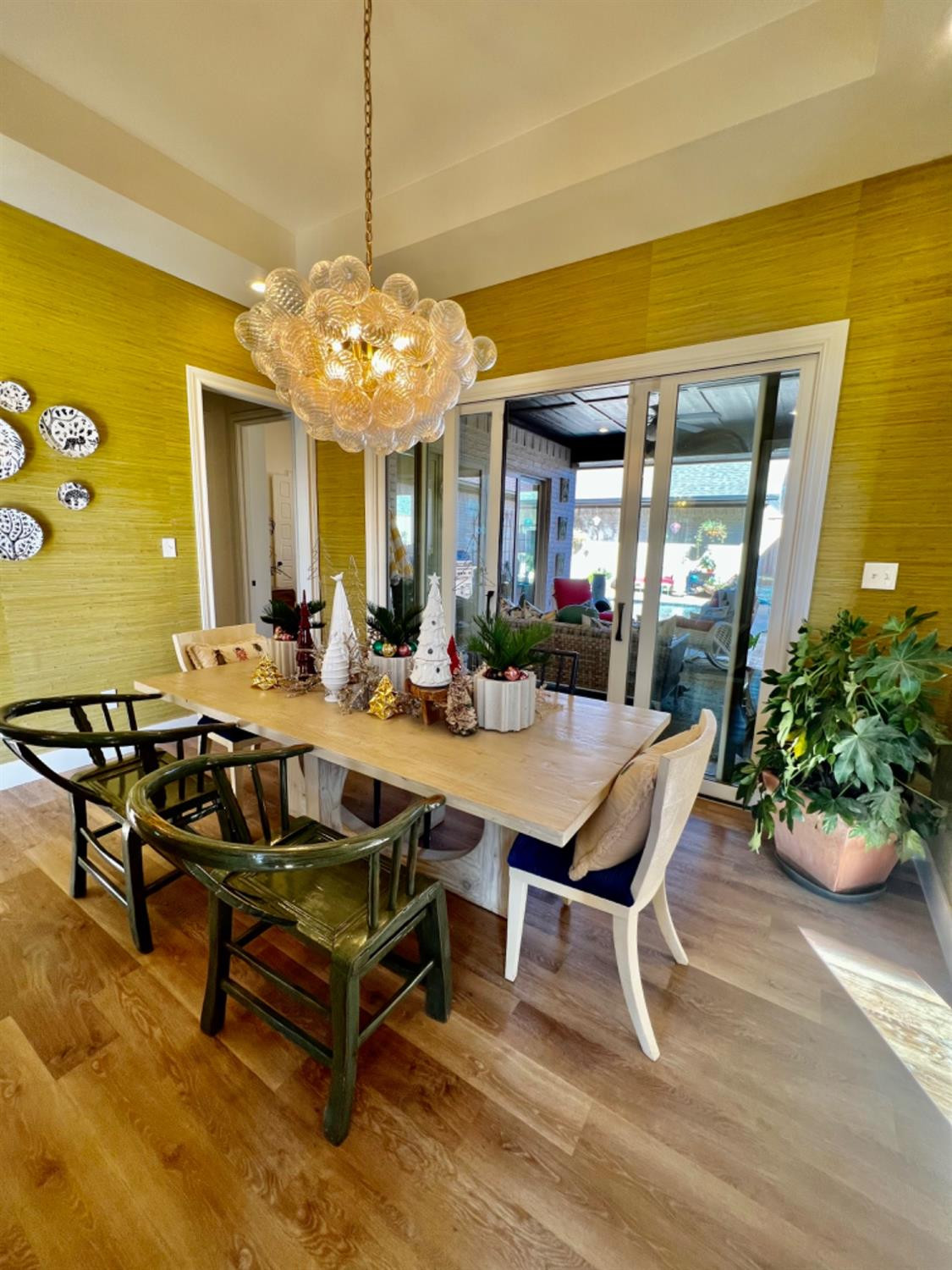 5902 112th Street Lubbock, TX 79424 - Photo 25 of 47 a view of a dining room with furniture window and wooden floor