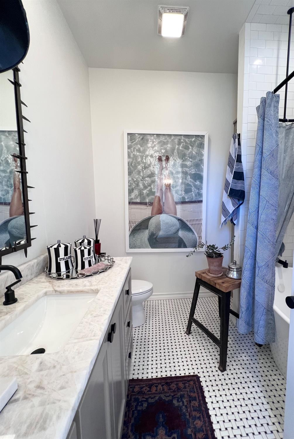 5902 112th Street Lubbock, TX 79424 - Photo 38 of 47 a bedroom with a bed and a table in it