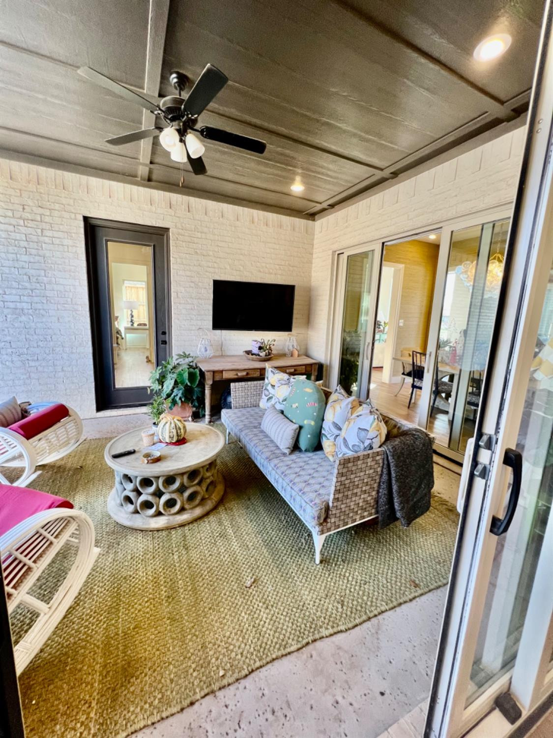 5902 112th Street Lubbock, TX 79424 - Photo 45 of 47 a living room with furniture and a flat screen tv