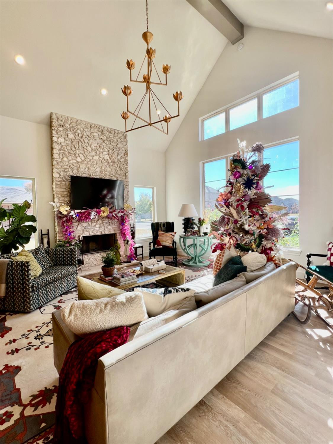 5902 112th Street Lubbock, TX 79424 - Photo 6 of 47 a living room with furniture and a fireplace